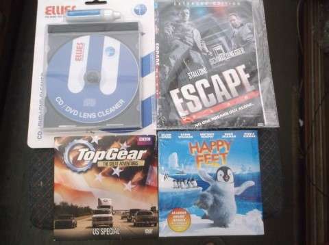 DVD'S  -  ESCAPE PLAN ( STALLONE AND SCHWARZENEGGER ) / HAPPY FEET / TOP GEAR / ELLIES LENS CLEANER